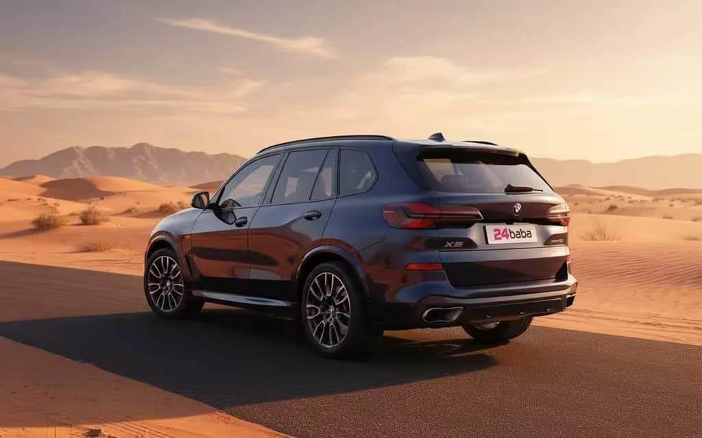 Bmw X5 2025 Blue rear view showing taillights – rental in Dubai