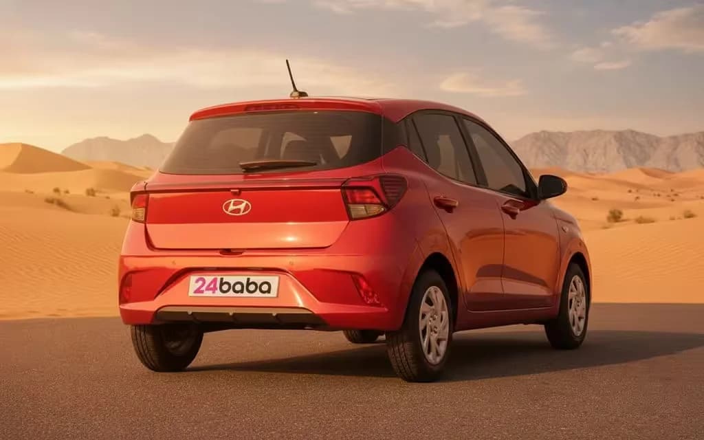 Hyundai GrandI10 2023 Red rear view showing taillights – rental in Dubai