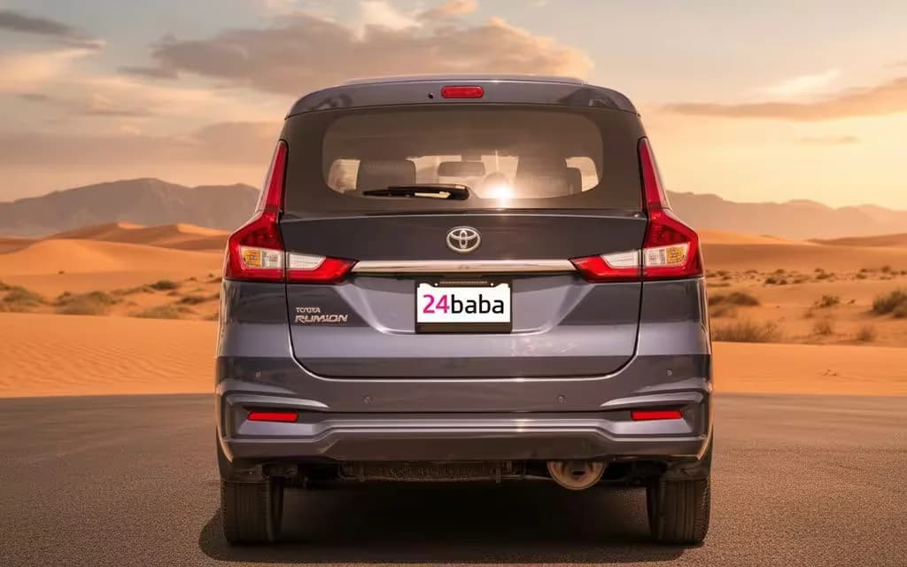 Toyota Rumion 2024 Blue rear view showing taillights – rental in Dubai