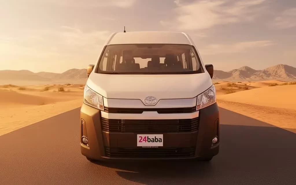Toyota Hiace 2025 White front view with headlights – rental in Dubai