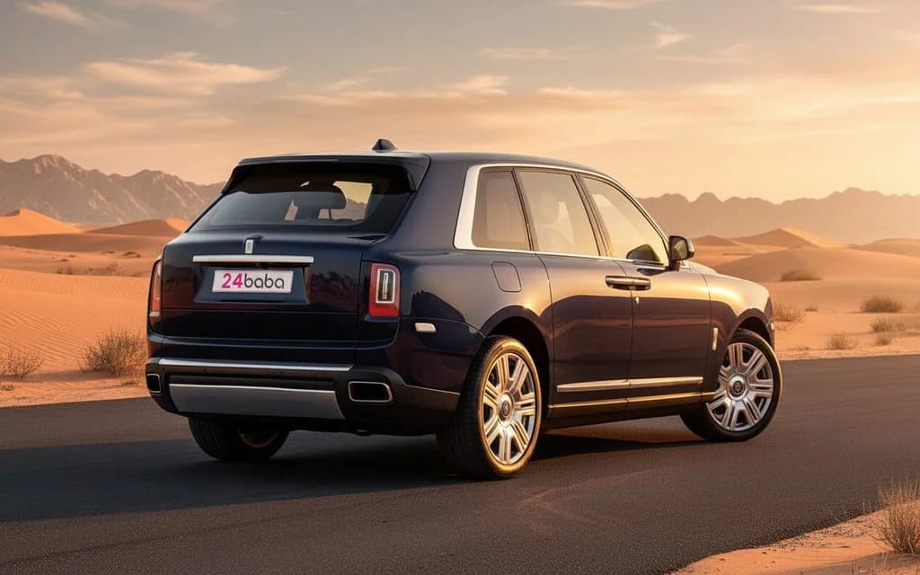 RollsRoyce Cullinan 2023 Blue rear view showing taillights – rental in Dubai