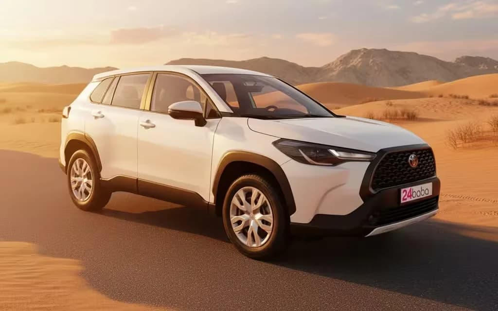 Toyota CorollaCross 2024 White front view with headlights – rental in Dubai