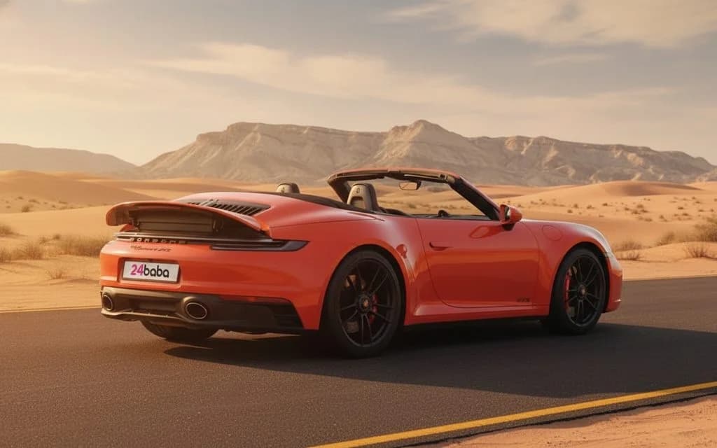 Porsche 911 2022 Orange rear view showing taillights – rental in Dubai
