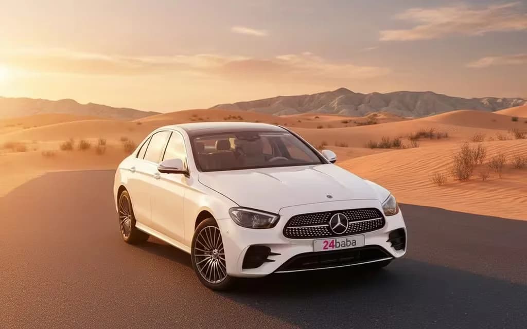 Mercedes E450 2021 White cover image – rental in Dubai