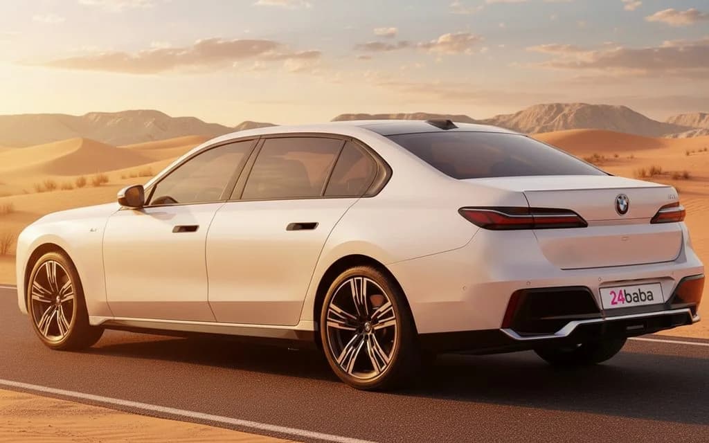 Bmw 735 2023 White rear view showing taillights – rental in Dubai