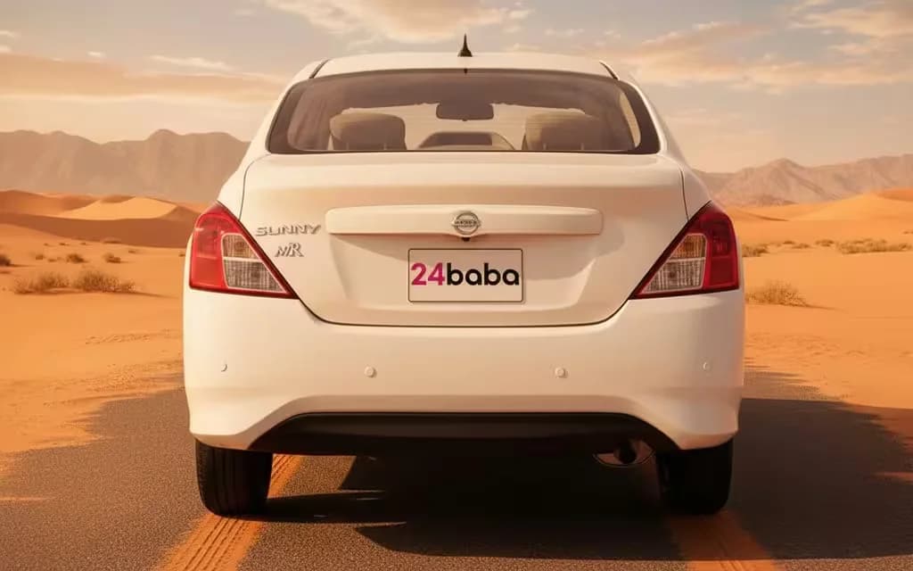 Nissan Sunny 2023 White rear view showing taillights – rental in Dubai