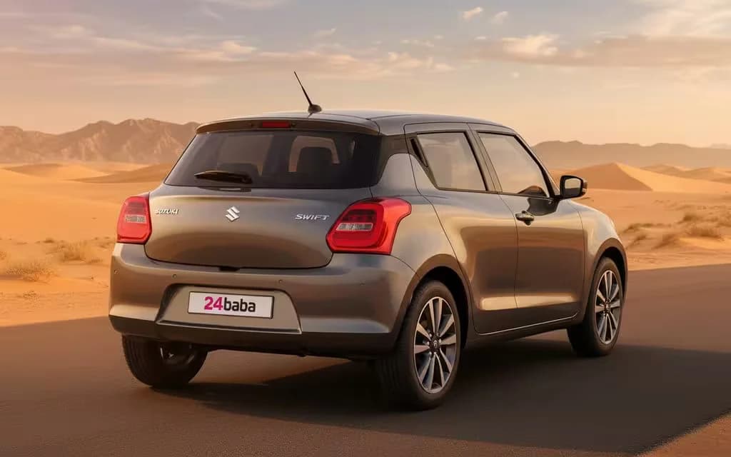 Suzuki Swift 2023 Grey rear view showing taillights – rental in Dubai