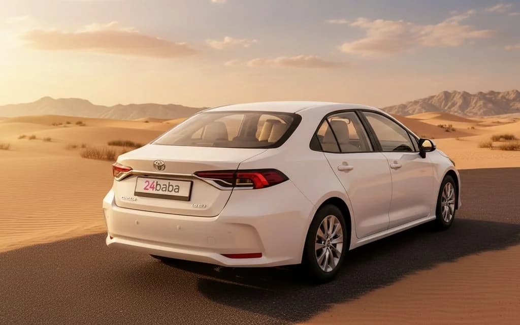 Toyota Corolla 2022 White rear view showing taillights – rental in Dubai