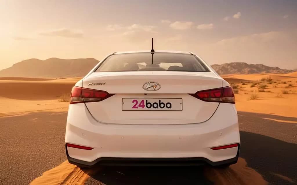Hyundai Accent 2025 White rear view showing taillights – rental in Dubai