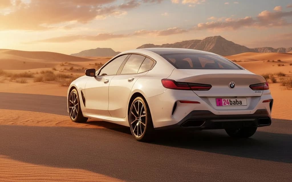 Bmw 840 2024 White rear view showing taillights – rental in Dubai