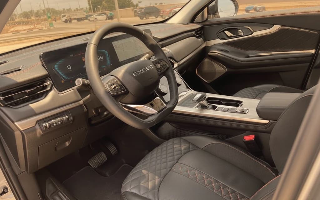 Exeed TXL 2024 Gray interior view – rental in Dubai