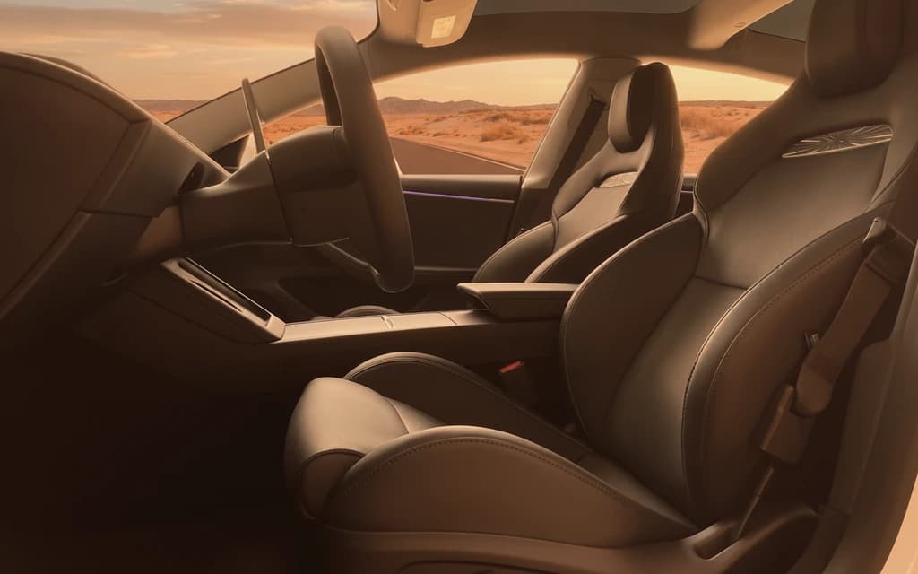Tesla Model 3 Performance 2024 White front seats – rental in Dubai