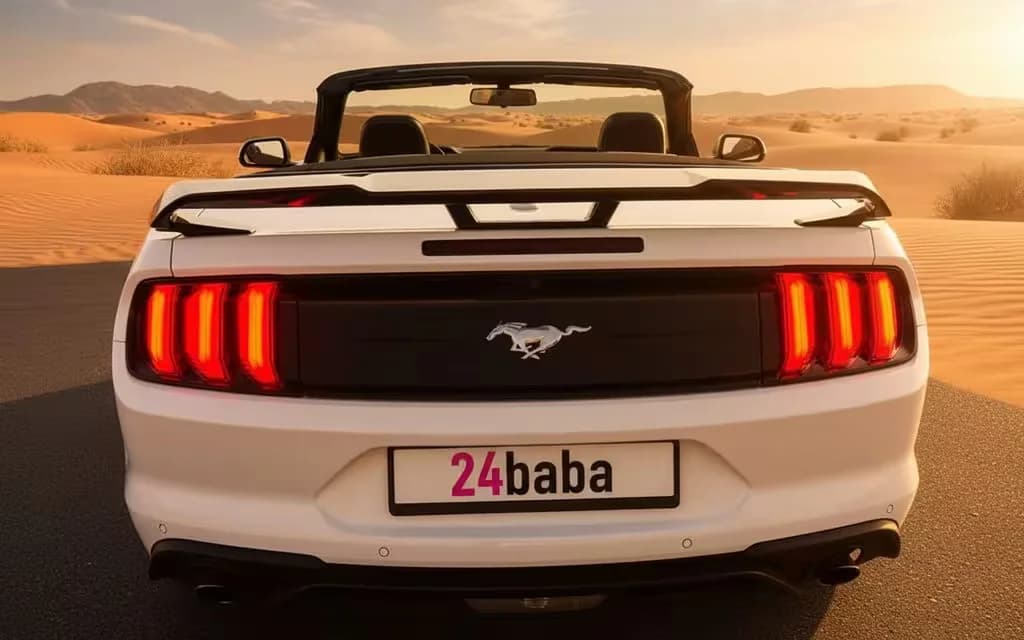 Ford Mustang 2023 White rear view showing taillights – rental in Dubai