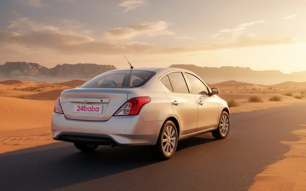 Nissan Sunny 2022 Silver rear view showing taillights – rental in Dubai